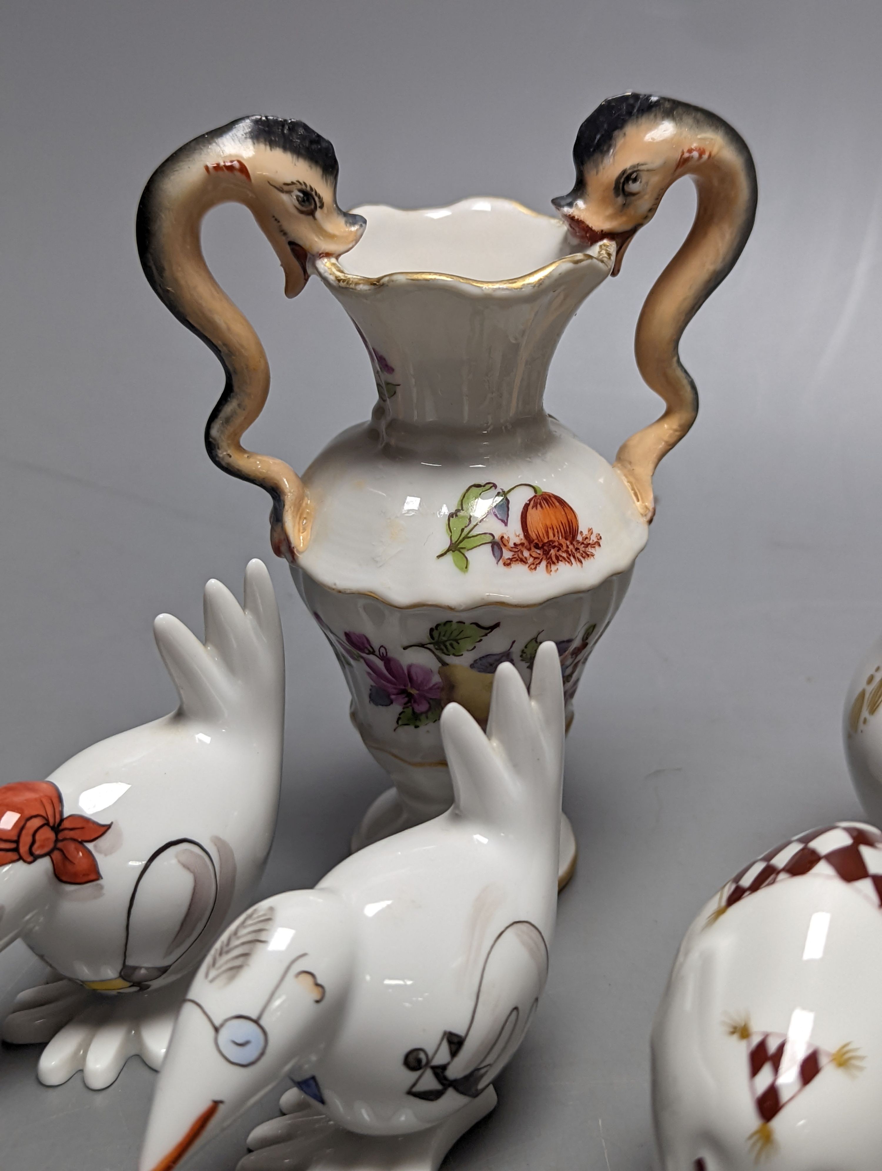 A group of seven small Meissen ornaments, two-handled vase 12cm.